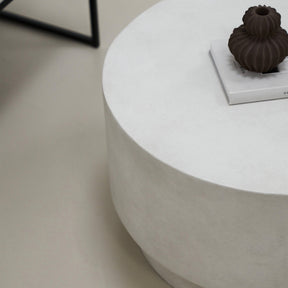 Closeup of Minimalist white concrete round coffee table