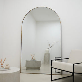 Champagne Full Length Arched Metal Mirror as living room lean to