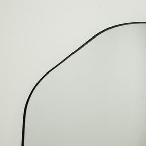 Detail shot of Large Full Length Irregular Arched Black Metal Mirror arch